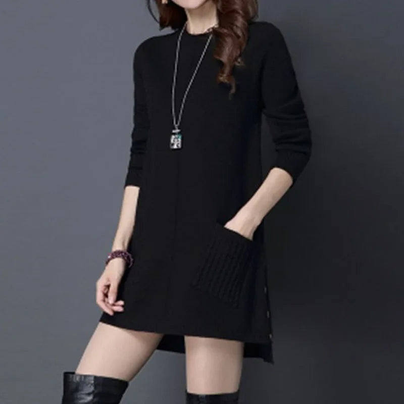 Long women's Madison midi sweater dress with a relaxed fit, ideal for cozy winter fashion, elegant cable knit & pockets.