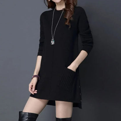 Long women's Madison midi sweater dress with a relaxed fit, ideal for cozy winter fashion, elegant cable knit & pockets.