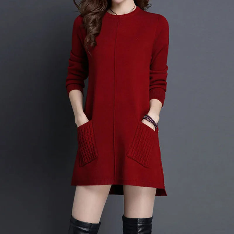 Cozy women's Madison cable knit midi sweater dress, relaxed fit, perfect for elegant winter casual wear with pockets.