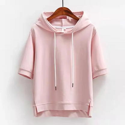Women's Maison short-sleeve relaxed hoodie for casual wear, offering comfort and style.
