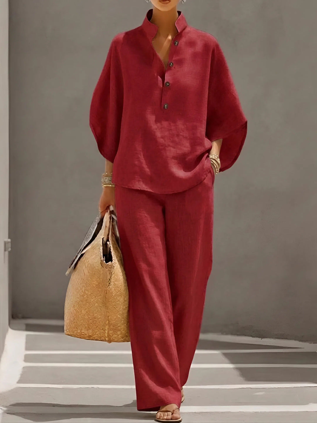 Sophisticated women's two-piece set, mandarin collar blouse with comfortable wide-leg trousers.
