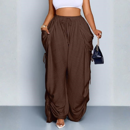 Stylish women's flowy wide leg pants. High-waisted with a drawstring, perfect for comfortable casual or everyday wear.