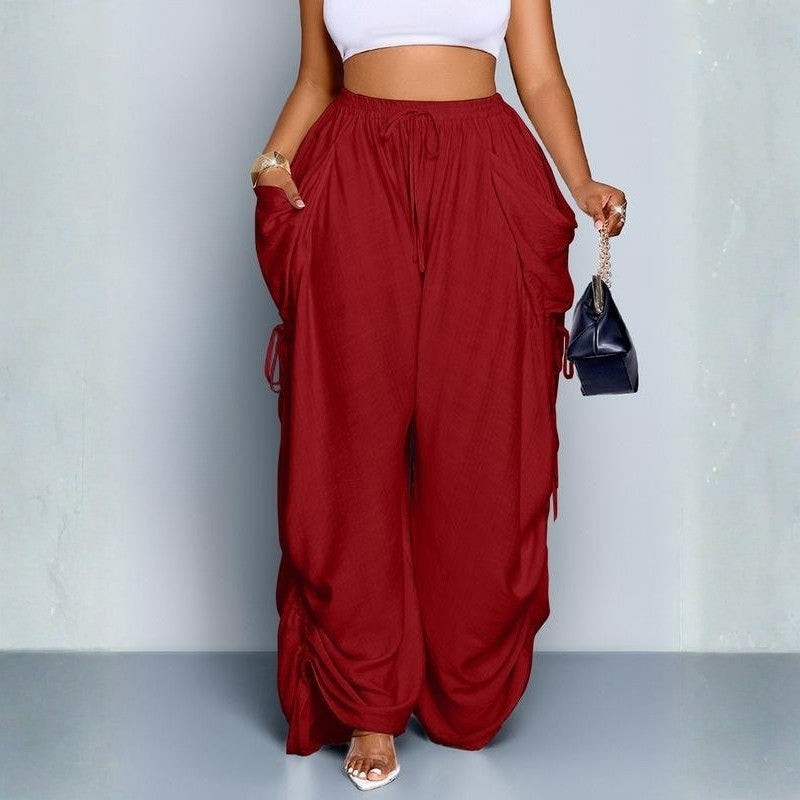 Flowy women's wide leg pants. High-waisted, drawstring, stylish & versatile for elegant, comfortable everyday fashion.