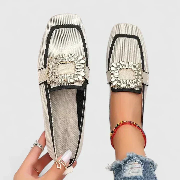 Woman wearing Maylora orthopedic slip-on loafers, enjoying all-day comfort & elegant foot support.