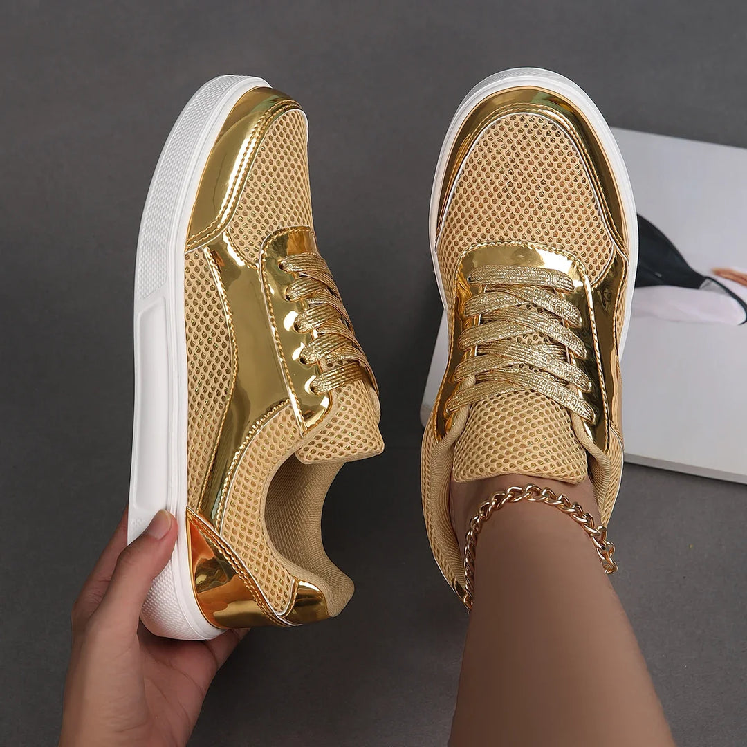Fashionable metallic mesh lace-up sneakers for women. Chic and stylish casual footwear, perfect for everyday.