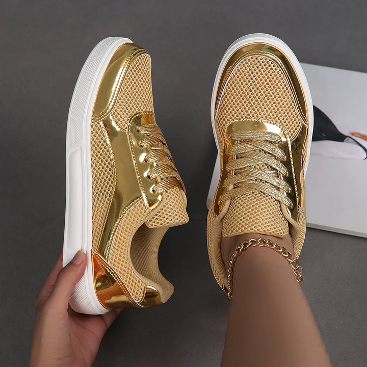 Fashionable metallic mesh lace-up sneakers for women. Chic and stylish casual footwear, perfect for everyday.