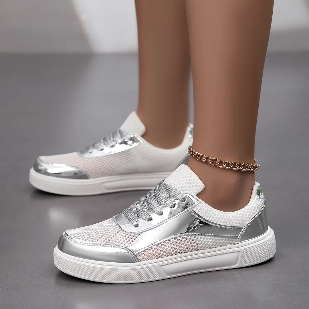 Stylish women's metallic mesh lace-up sneakers. Perfect casual footwear, offering comfort & fashion for daily wear.