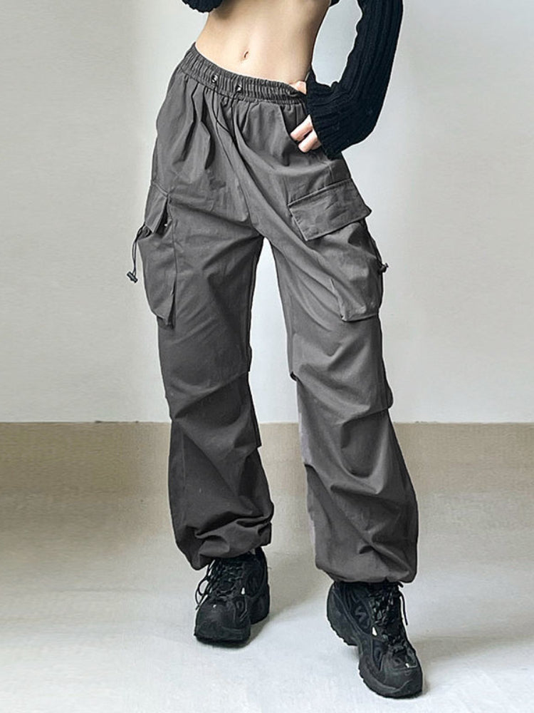 Comfortable women's cargo pants with adjustable waist and utility pockets, ideal for casual everyday fashion.