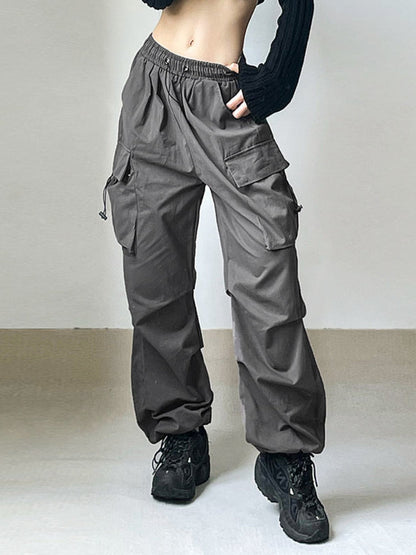 Comfortable women's cargo pants with adjustable waist and utility pockets, ideal for casual everyday fashion.