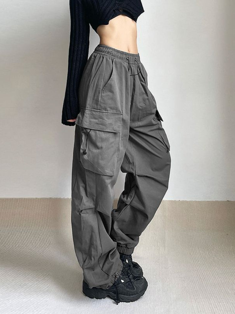 Wide leg women's cargo pants, relaxed fit, designed for comfort and urban streetwear style.
