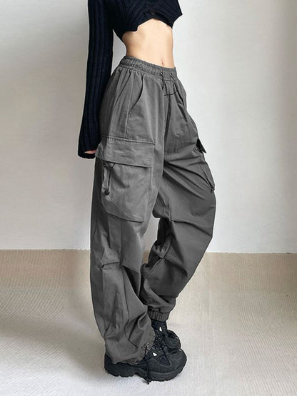 Wide leg women's cargo pants, relaxed fit, designed for comfort and urban streetwear style.