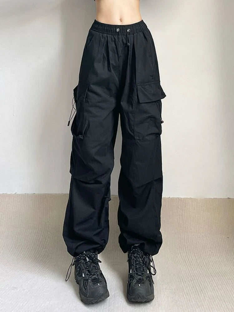 Urban style women's cargo pants, relaxed fit, utility pockets, perfect for city adventures & comfort.