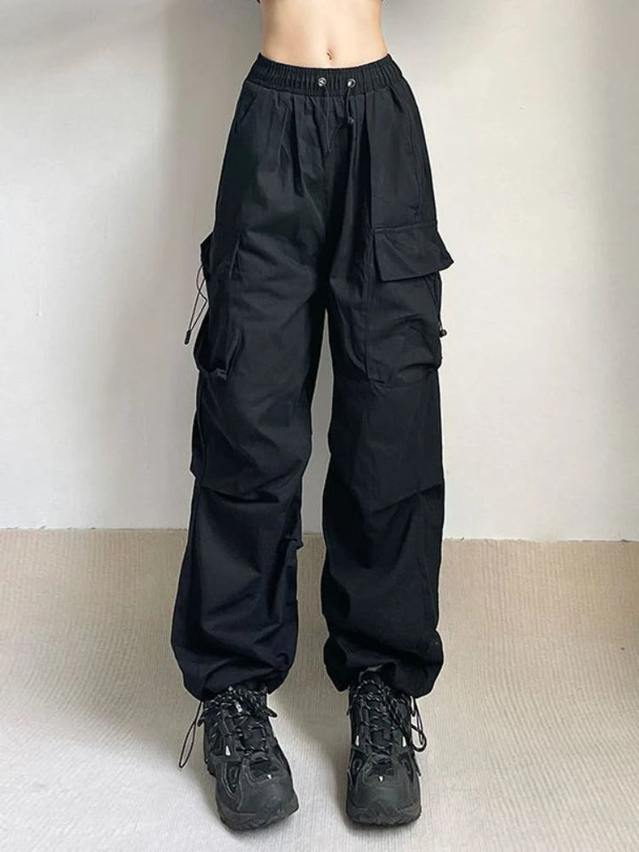 Urban style women's cargo pants, relaxed fit, utility pockets, perfect for city adventures & comfort.