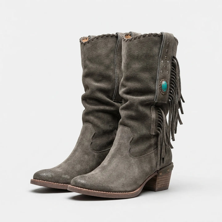 Comfortable women's mid-calf fringe western boots. Stylish boho footwear with a durable block heel.