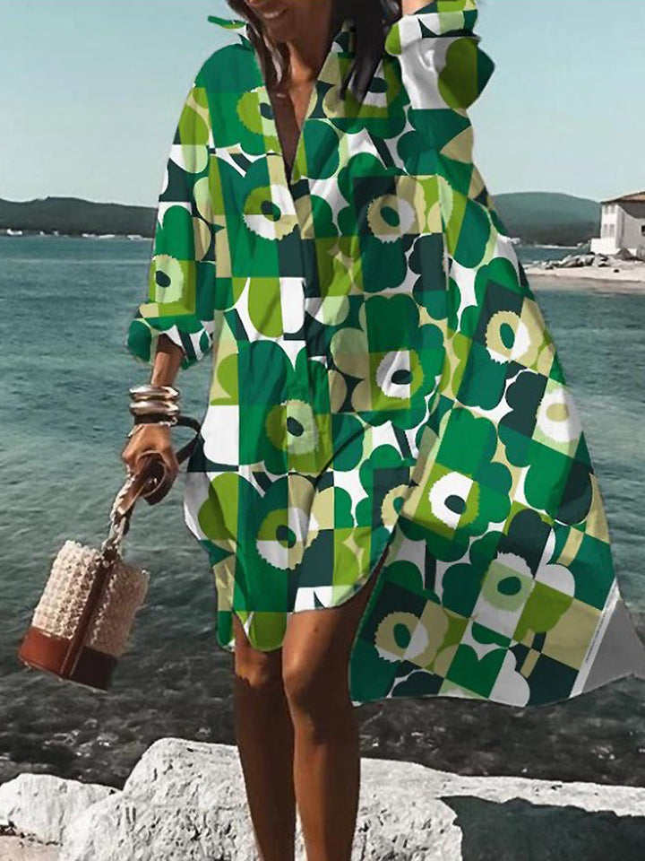 Casual women's midi dress with short sleeves & full button closure. Relaxed fit for summer style.