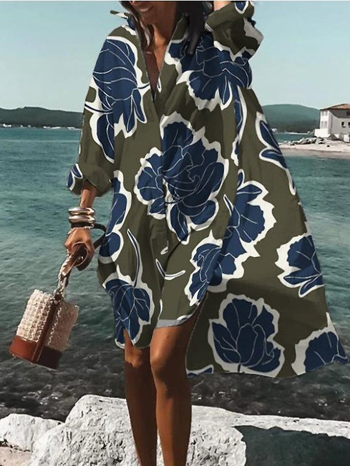Oversized women's midi shirt dress, short sleeves, button closure. Essential for relaxed summer fashion.
