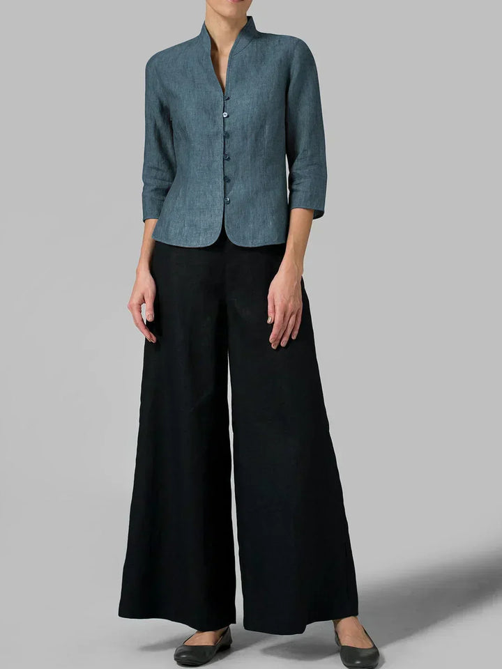 Women's chic minimalist blouse, button-front design with 3/4 sleeves. A versatile top for modern casual workwear.