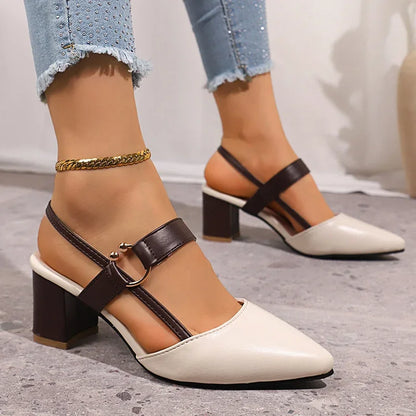 Women's brown strap heels with ring detail, block heel; chic and comfortable footwear.