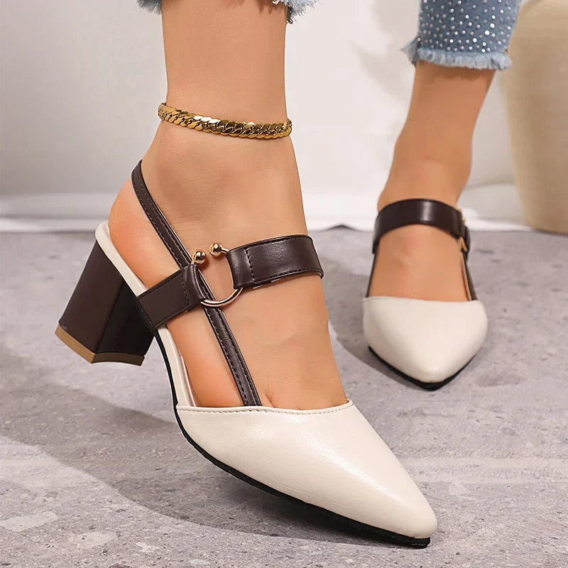 Elegant black women's block heel shoes with sophisticated ring detail; perfect for events.