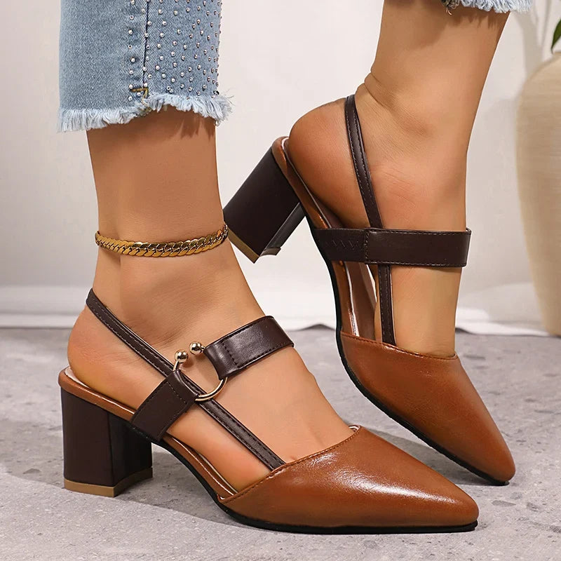 Stylish black women's ring heels with a comfortable block heel for any occasion.