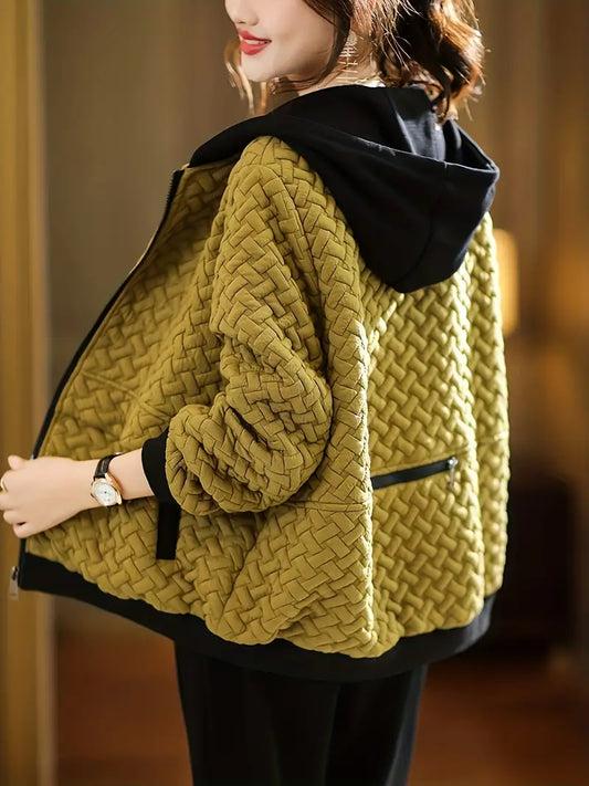Women's Mirelle quilted hoodie jacket, stylish layering piece for casual winter fashion.