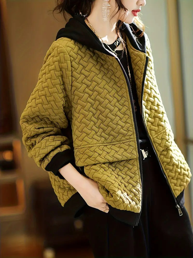 Cozy women's quilted hoodie jacket with a modern basketweave pattern & convenient zip-up front.