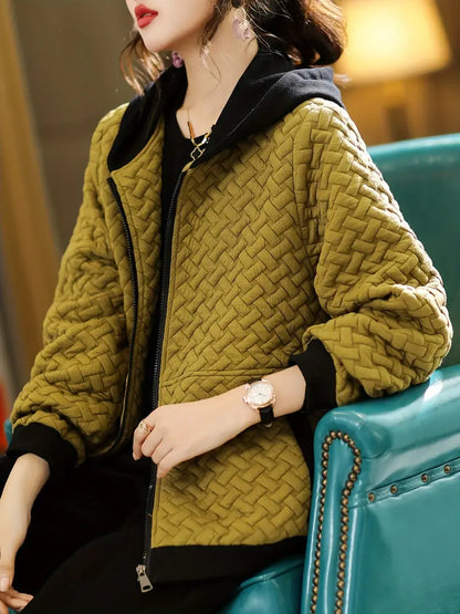 Modern style women's quilted hooded jacket, perfect casual outerwear for chilly winter days.