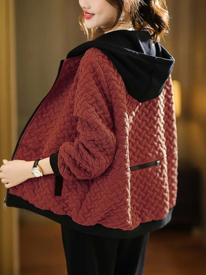 Warm women's Mirelle quilted hoodie jacket, a cozy zip-up for comfortable winter fashion.