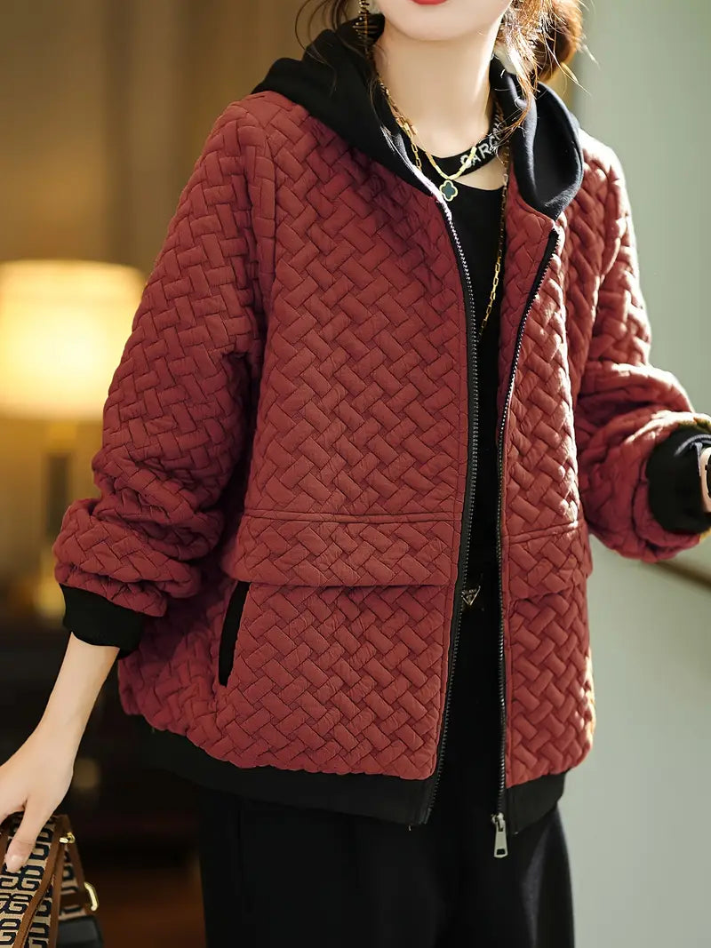 Women's Mirelle zip-up quilted hoodie jacket, combining comfort, modern style, & warmth.
