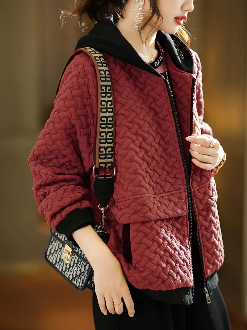 Essential women's quilted hooded jacket, a versatile piece for stylish casual layering in winter.