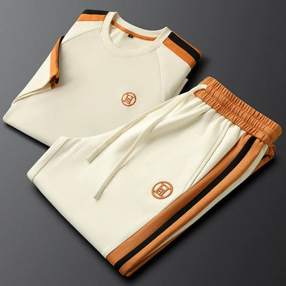 Relaxed fit women's two-piece Monaco tracksuit set, ideal comfort wear for loungewear or travel outfits.