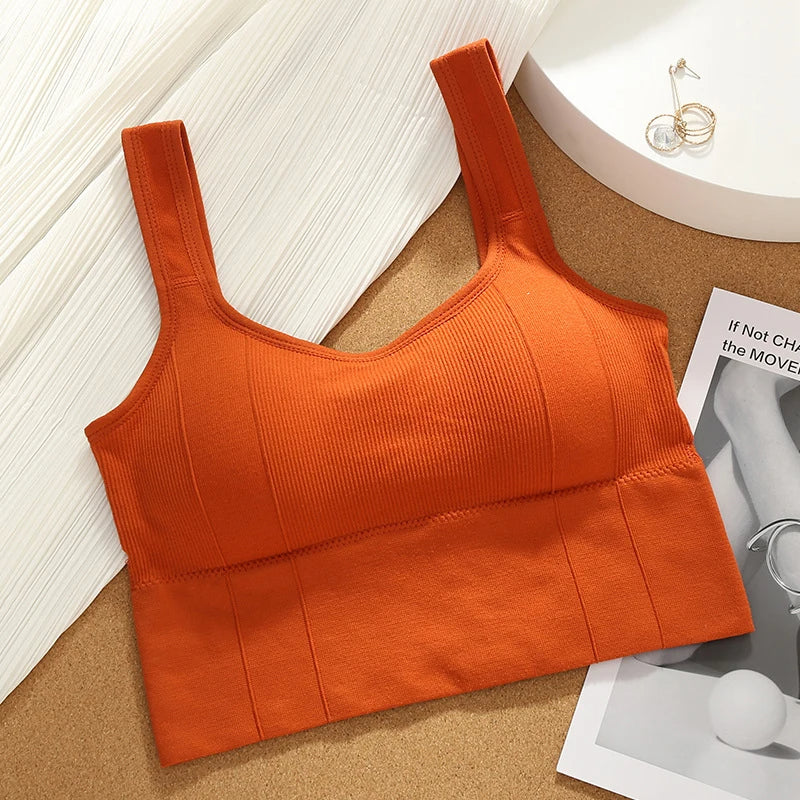 Moisture-wicking seamless ribbed sports bra for women, Motion Core design offers comfort and support for fitness.