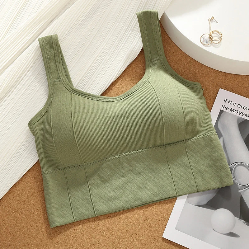 Woman wearing Motion Core seamless sports bra during a workout, demonstrating comfort and support.