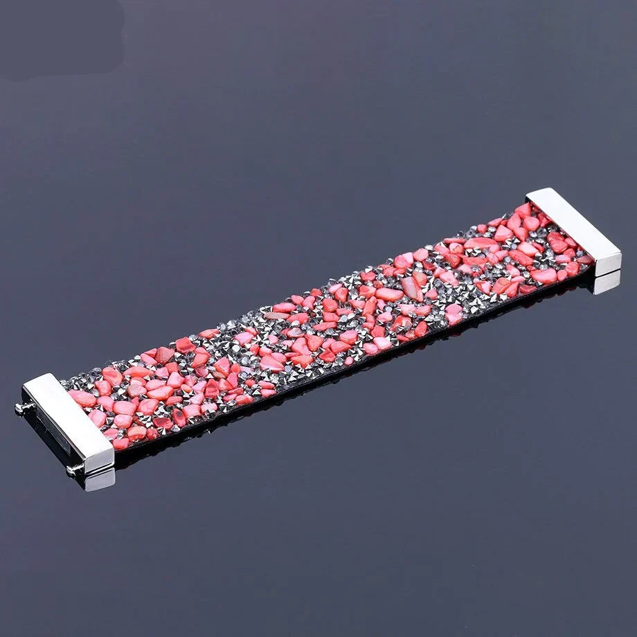 Fashionable women's natural stone crystal bracelet with genuine leather strap. Adjustable fit.