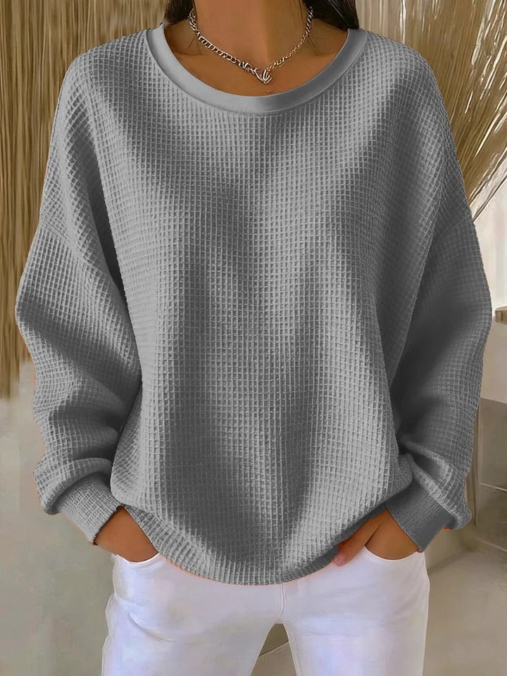 Women's classic long-sleeve sweater, a comfortable and versatile pullover, perfect for effortless everyday style.