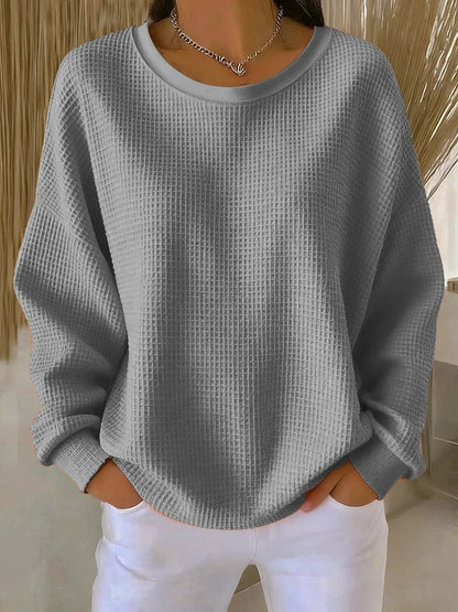 Women's classic long-sleeve sweater, a comfortable and versatile pullover, perfect for effortless everyday style.