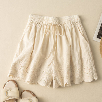 White Nova embroidered women's shorts. Ideal casual beachwear or summer vacation outfit.