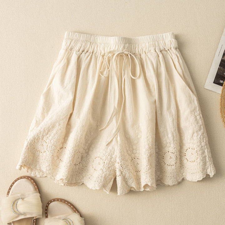 White Nova embroidered women's shorts. Ideal casual beachwear or summer vacation outfit.