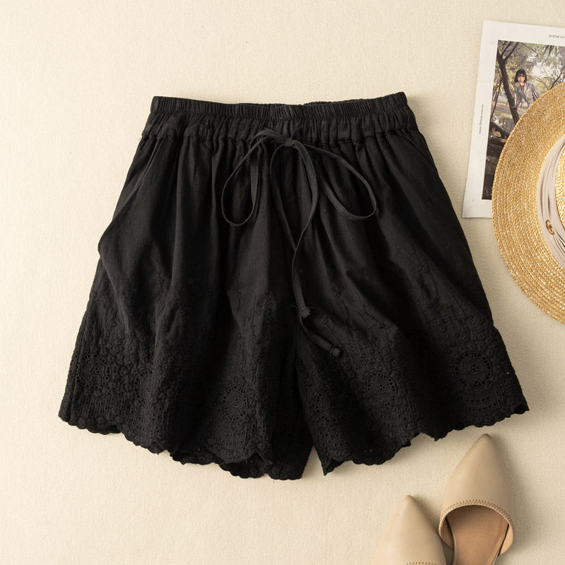 Beige Nova embroidered casual shorts for women. Relaxed fit with drawstring, perfect for summer.