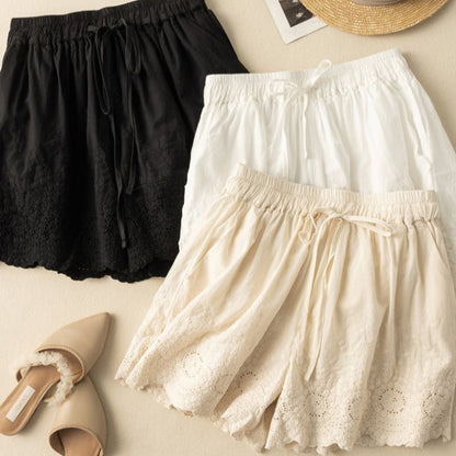 Relaxed fit Nova women's shorts with comfy drawstring waist. Embroidered casual summer style.