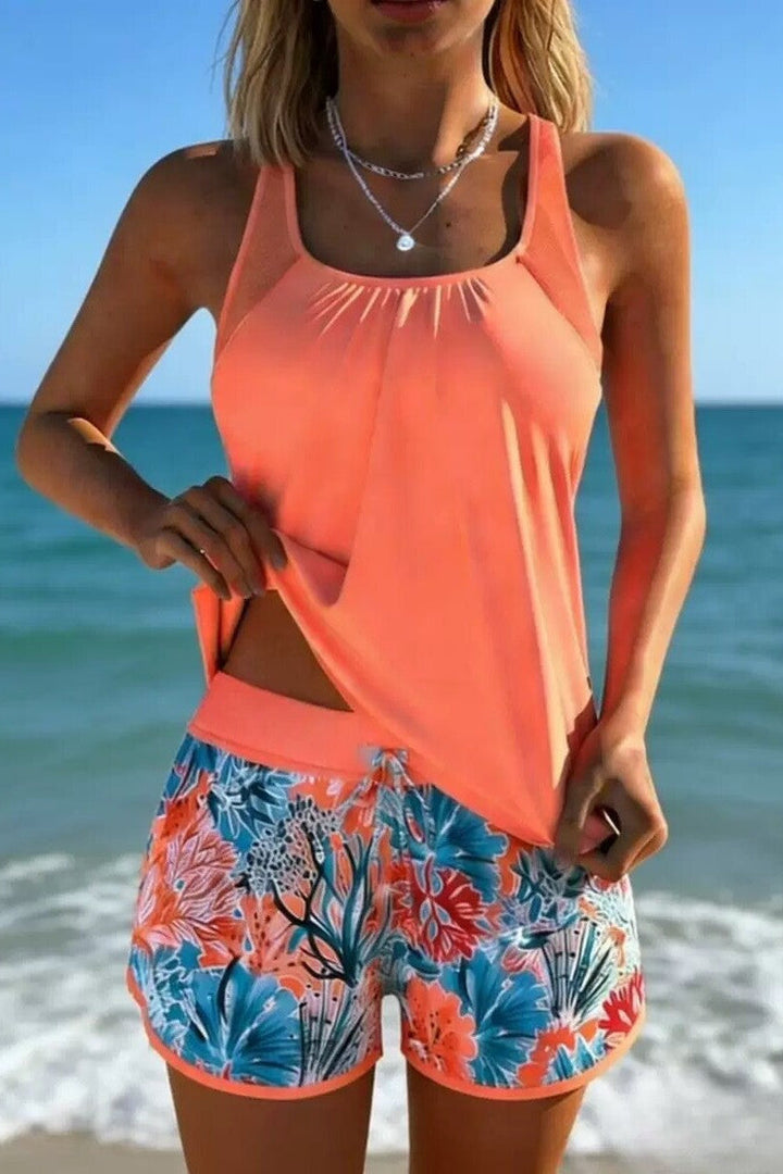 Modest women's two-piece tankini swim set in an ocean breeze design, great for pool parties & beachwear.