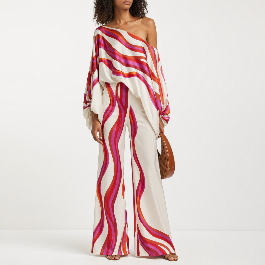 Stylish women's summer off-shoulder top & shorts set with a vibrant print and lantern sleeves.