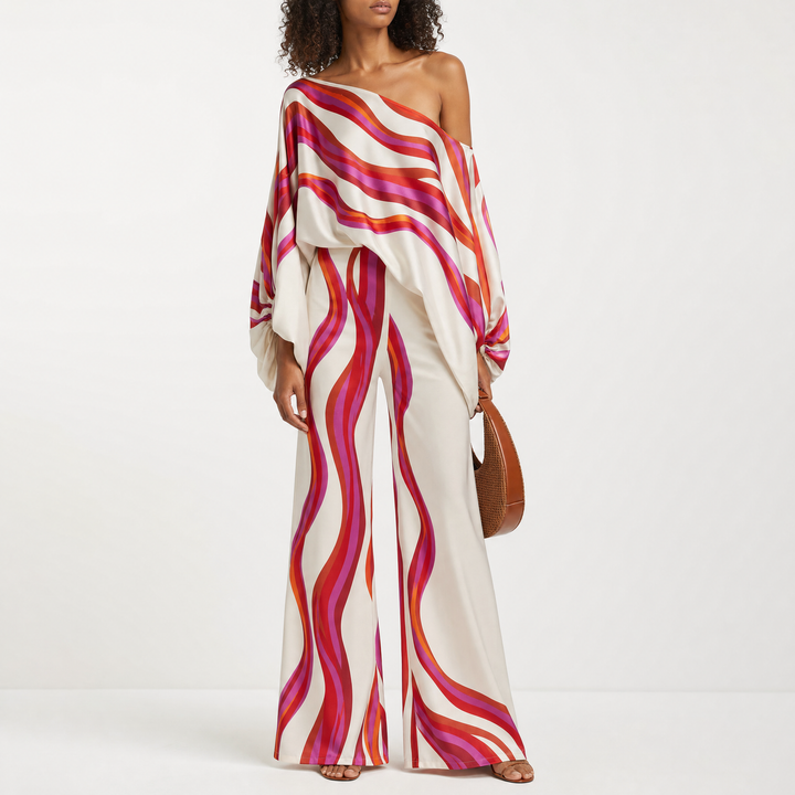 Stylish women's summer off-shoulder top & shorts set with a vibrant print and lantern sleeves.