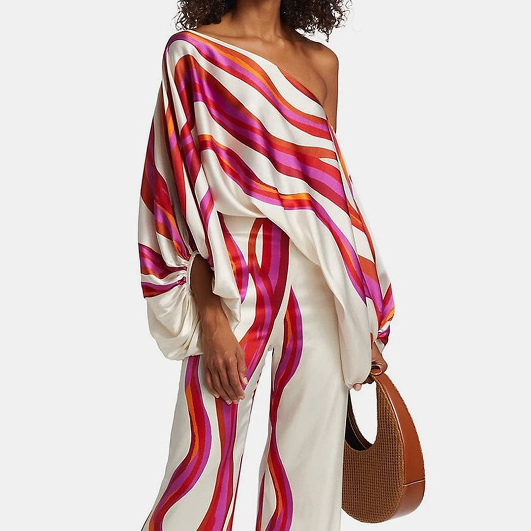 Comfortable women's two-piece summer outfit: off-shoulder printed top and coordinating shorts.