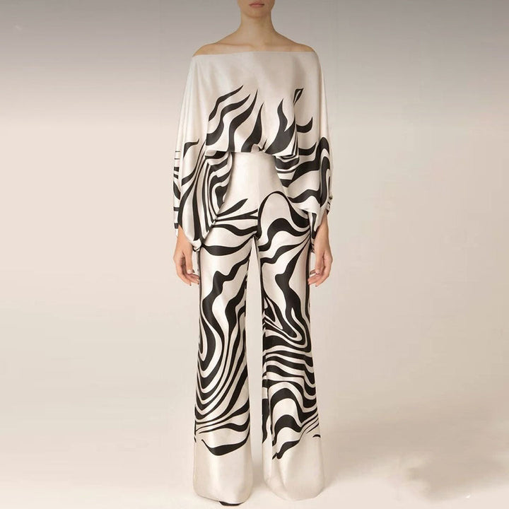 Vibrant printed off-shoulder two-piece summer set for women, a stylish and breezy casual outfit.