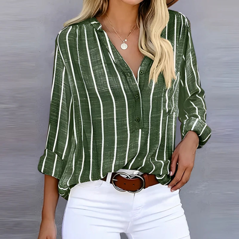 Women's Olanta striped blouse featuring a light, flowing fabric. A comfortable and versatile top for casual wear.