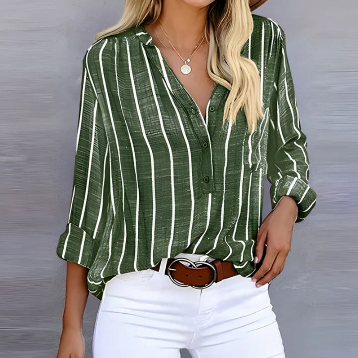 Women's Olanta striped blouse featuring a light, flowing fabric. A comfortable and versatile top for casual wear.