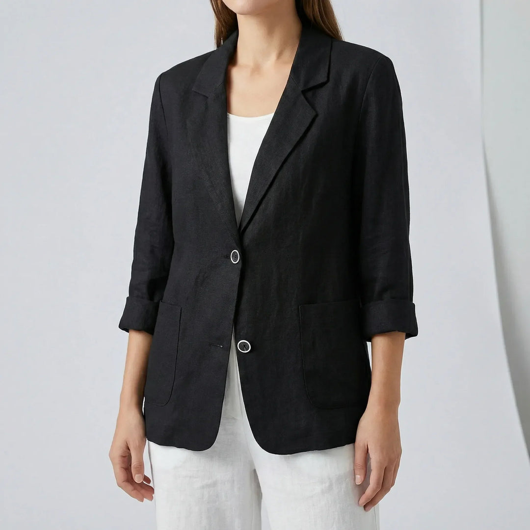 Stylish women's relaxed fit blazer with three-quarter sleeves & patch pockets. Versatile for office or spring.