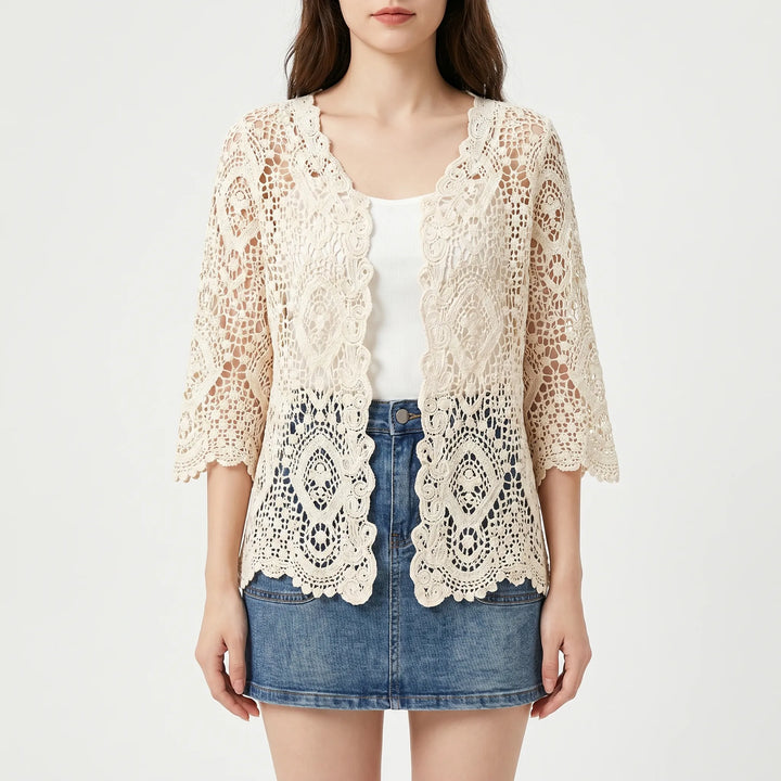 Elegant white women's open-front crochet cardigan, ideal lightweight summer cover-up for bohemian style.