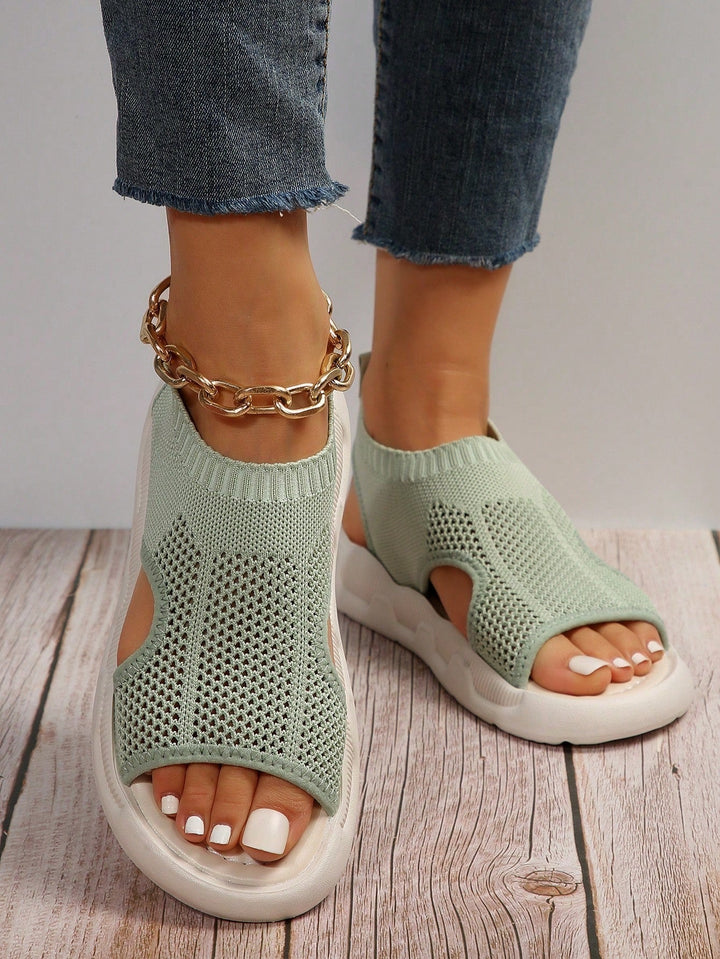 Feather-light women's open toe flatform sandals, comfortable slip-on for summer walks.